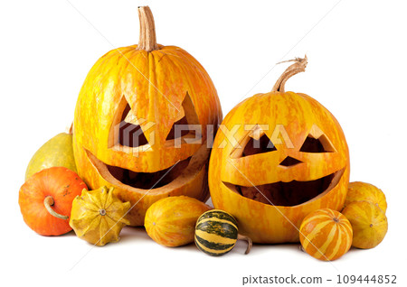Scary Halloween pumpkins isolated on a white background. Scary glowing faces trick or treat 109444852