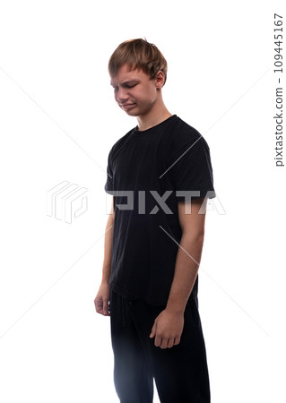 Blonde teenager wearing a basic t-shirt on a white background 109445167