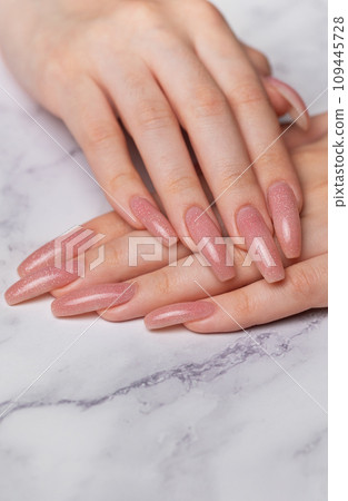 Female hands with beautiful manicure 109445728