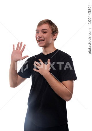 Satisfied Caucasian fair-haired teenager guy is happy Satisfied Caucasian fair-haired teenager guy is happy 109445894