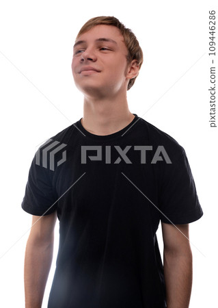 Close-up portrait of a European teenage boy with brown hair Close-up portrait of a European teenage boy with brown hair 109446286