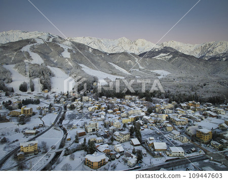 Beautiful pre-dawn Hakuba Mountain Range and Happo-one Ski Resort, Hakuba Village, Nagano Prefecture (aerial shot by drone) 109447603