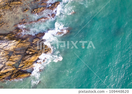 Aerial view drone shot of Tropical seashore in Phuket island thailand,Beautiful crashing waves sea landscape background Aerial view drone shot of Tropical seashore in Phuket island thailand,Beautiful crashing waves sea landscape background 109448620