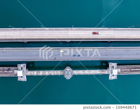 Aerial top view drone shot of bridge with cars on bridge road image transportation background concept,Aerial view of sarasin bridge in Phuket Thailand transportation background,Top view Aerial top view drone shot of bridge with cars on bridge road image transportation background concept,Aerial view of sarasin bridge in Phuket Thailand transportation background,Top view 109448671