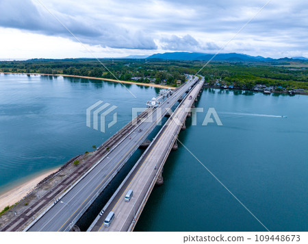 Aerial top view drone shot of bridge with cars on bridge road image transportation background concept,Aerial view of sarasin bridge in Phuket Thailand transportation background,Top view Aerial top view drone shot of bridge with cars on bridge road image transportation background concept,Aerial view of sarasin bridge in Phuket Thailand transportation background,Top view 109448673