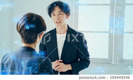 Business person having a meeting and digital data image 109449546