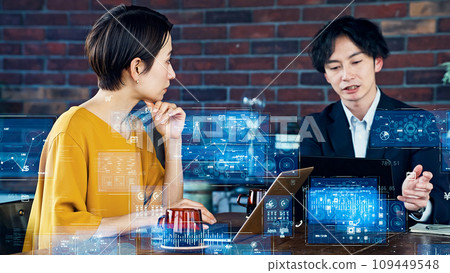 Business person having a meeting and digital data image Business person having a meeting and digital data image 109449548
