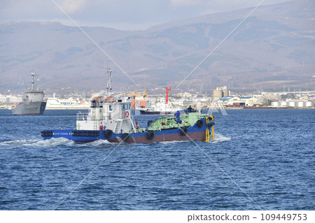 Photographing the scenery of a small tanker heading to the site at Hakodate Port in Hakodate City, Hokkaido in winter 109449753