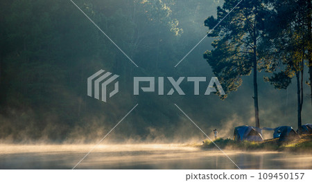 Photographer travel and camping at natural park in Thailand. Photographer travel and camping at natural park in Thailand. 109450157