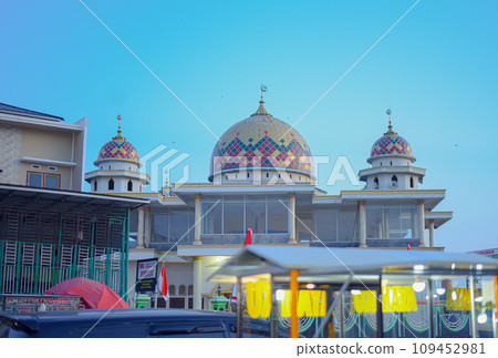 The Beauty of Islamic Mosques in Indonesia Against the Background of Blue Sky The Beauty of Islamic Mosques in Indonesia Against the Background of Blue Sky 109452981
