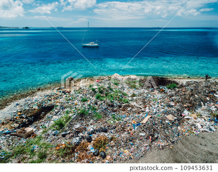 Toxic dump in Maldives island. Aerial view of pollution by rubbish 109453631