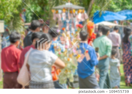 Blurred Burmese people dress in national clothes, Came out happily during the Kathin merit-making Blurred Burmese people dress in national clothes, Came out happily during the Kathin merit-making 109455739