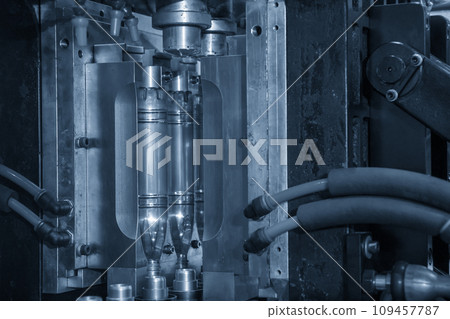 The drinking water bottle manufacturing process by blow mold machine. The drinking water bottle manufacturing process by blow mold machine. 109457787