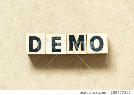 Alphabet letter block in word demo on wood background Alphabet letter block in word demo on wood background 109457831