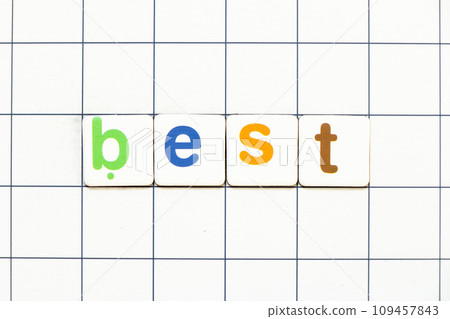 Colorful tile letter in word best on white grid background Colorful tile letter in word best on white grid background 109457843