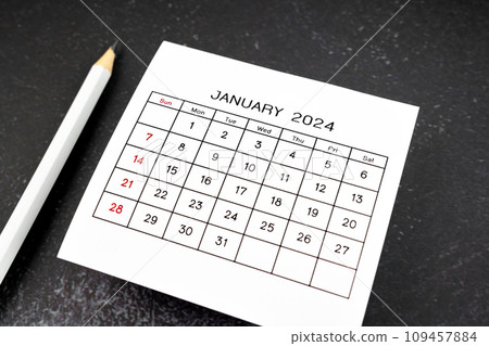 White calendar page for January 2024 and pencil White calendar page for January 2024 and pencil 109457884