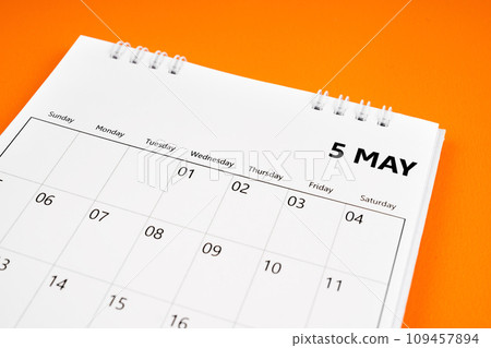 May 2024 month calendar on orange color cover background. 109457894