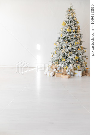 Christmas tree with gifts and toys in the interior of the room New Year 109458899