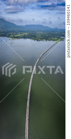 Aerial view of the floating train in Pasak Chonlasit Dam, Lopburi, Thailand Aerial view of the floating train in Pasak Chonlasit Dam, Lopburi, Thailand 109460141