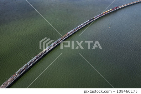 Aerial view of the floating train in Pasak Chonlasit Dam, Lopburi, Thailand Aerial view of the floating train in Pasak Chonlasit Dam, Lopburi, Thailand 109460173