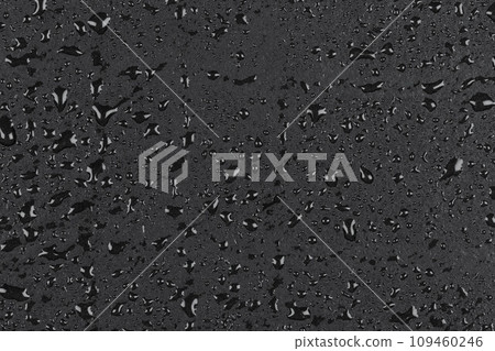 Water drops on dark stone Water drops on dark stone 109460246