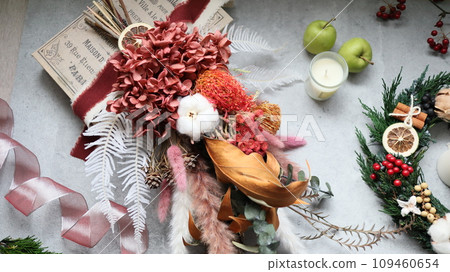 Dried flower swag and Christmas wreath 109460654