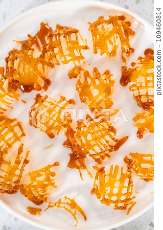 Crunchy caramel cupcake toppers on the counter. Crunchy caramel cupcake toppers on the counter. 109460814