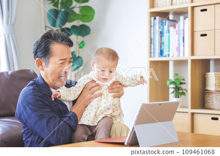 grandfather and grandson computer 109461068