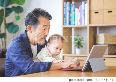 grandfather and grandson computer 109461075