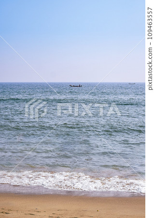 Scene of beach life on a Sunny day at renowned Indian seashore of Puri, Odisha, India,Asia. 12.02.2020. Scene of beach life on a Sunny day at renowned Indian seashore of Puri, Odisha, India,Asia. 12.02.2020. 109463557