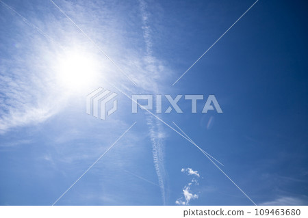 sun, blue sky and contrails sun, blue sky and contrails 109463680