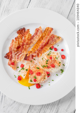 Poached eggs with bacon Poached eggs with bacon 109464840