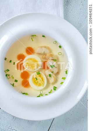 Chicken broth in plate 109464851