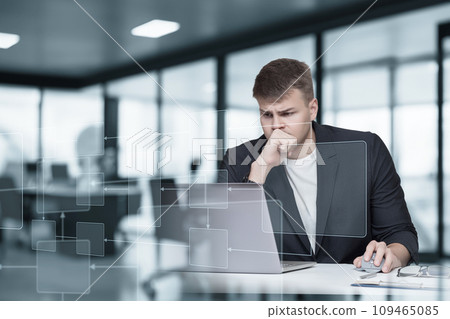 Male software developer sitting at laptop virtual computer . 109465085
