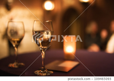 glass of water and candle glass of water and candle 109465093