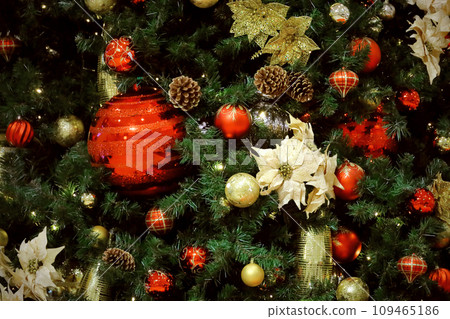 Closeup photo of ornaments decorated with Christmas tree 109465186