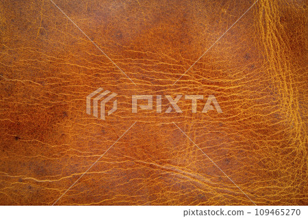 brown leather abstract from an old journal cover with scratches, marks and stains 109465270