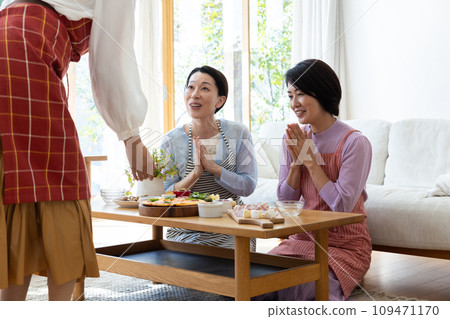 Women enjoying a home party Women enjoying a home party 109471170
