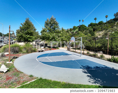 Recreational facilities with basketball court in residential community park in Califronia 109471983