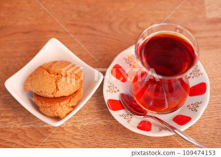 Traditional turkish tea on white table . Traditional turkish tea on white table . 109474153