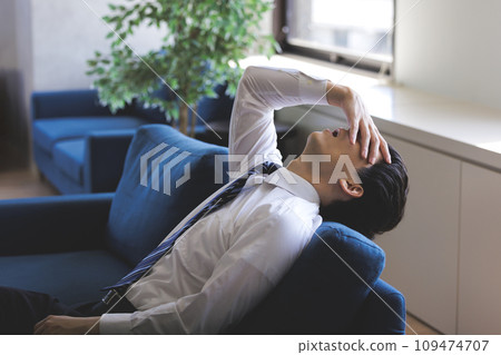 Male fatigue tired sofa 109474707