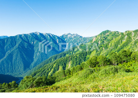 Climbing Mt. Jijigatake in summer (view of Mt. Harinoki and Mt. Renge from Taneike Sanso) Climbing Mt. Jijigatake in summer (view of Mt. Harinoki and Mt. Renge from Taneike Sanso) 109475080