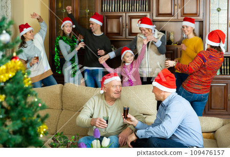 Family having fun on new year evening 109476157