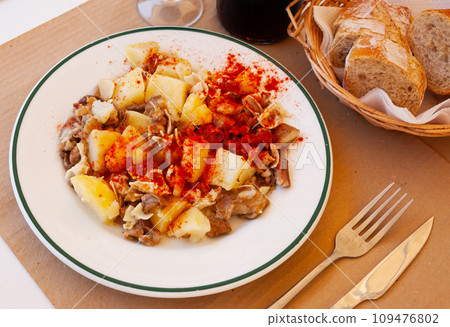 Spanish dish - roasted pig ears with spices 109476802