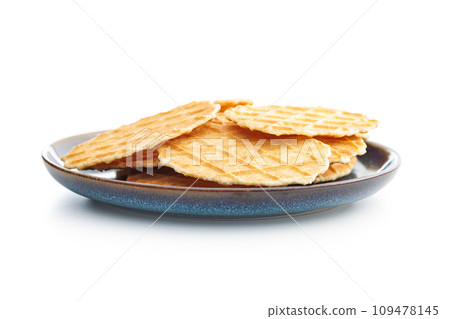Round waffle biscuits isolated on white background. 109478145