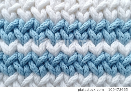 Macro photography of the texture of a knitted pattern in close-up, white and blue colors 109478665