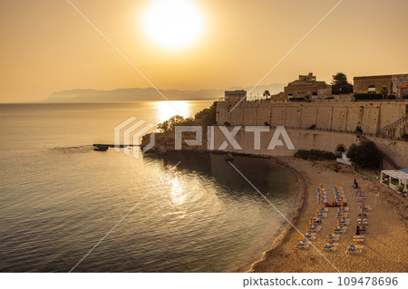 City beach in Castellammare del Golfo at sunrise. 109478696