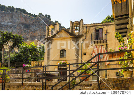 Historic building in street of Cefalu town. Historic building in street of Cefalu town. 109478704