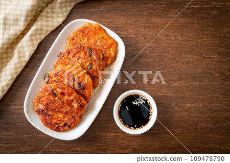 Korean Kimchi pancake or Kimchijeon - Fried Mixed Egg, Kimchi, and Flour 109478790