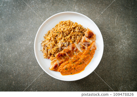 grilled chicken steak with red curry sauce and rice grilled chicken steak with red curry sauce and rice 109478826